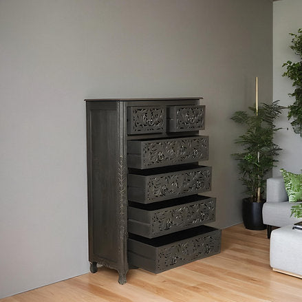 hand carved wooden chest of drawers