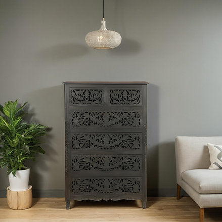 hand carved wooden chest of drawers